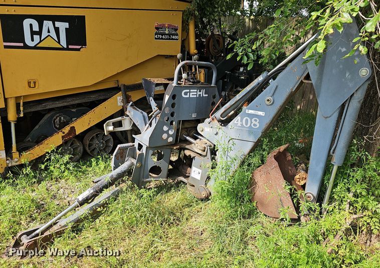 Bradco BH408 skid steer backhoe - EJ5515