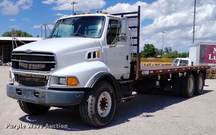 2004 Sterling  L9500 flatbed truck - DQ6129