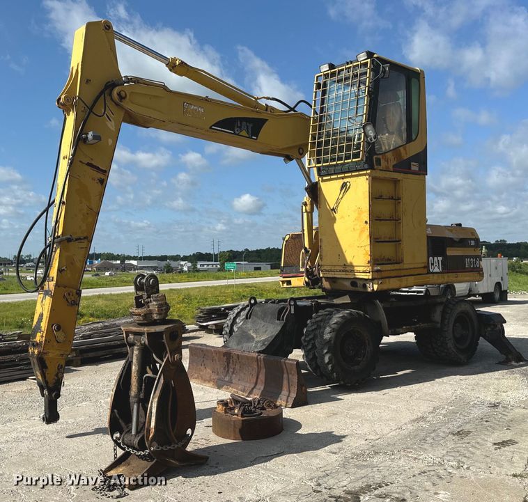 2000 Caterpillar M318 wheeled excavator - EH6924