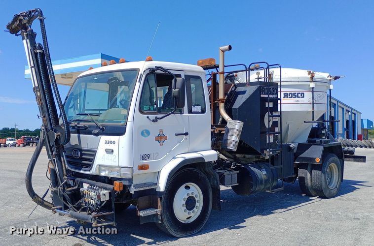 2009 Nissan 3500 Rosco Pro Patcher pothole patcher truck - DP1139