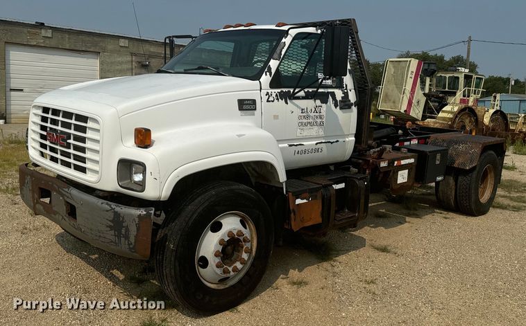 1997 GMC C7500 roll-off container truck - DQ6904