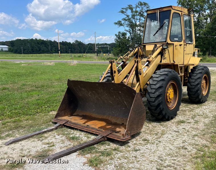 1980 Caterpillar  910 wheel loader - EK8915