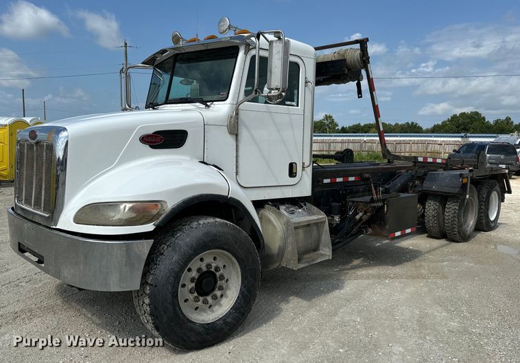 2006 Peterbilt 335 roll-off container truck - OF9915
