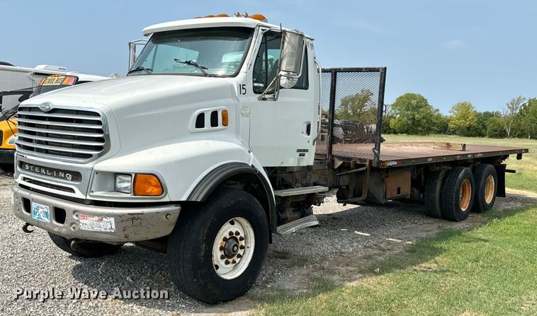 2005 Sterling L9500 flatbed truck - DX1130