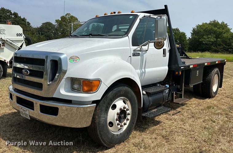 2011 Ford F650 flatbed truck - EJ8896