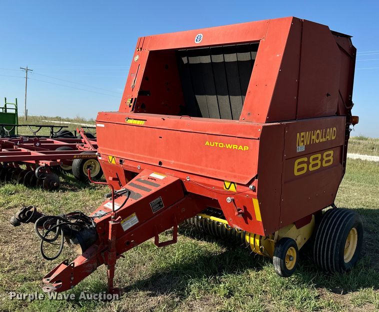 2001 New Holland 688 round baler - OE9242
