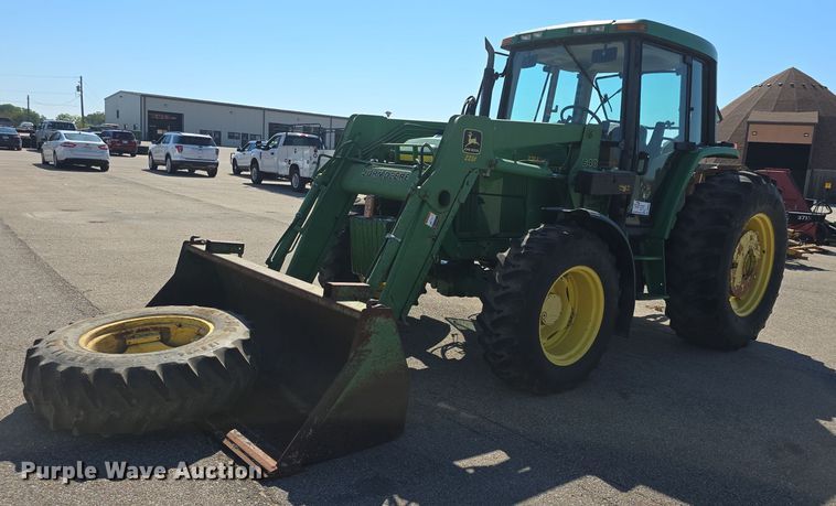1998 John Deere  6310 MFWD tractor - DQ4605