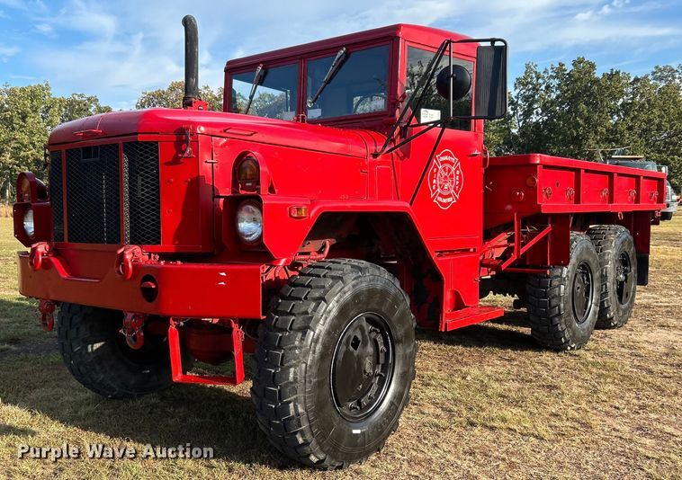 AM General Flat Bed Truck For Sale | Purple Wave Auction