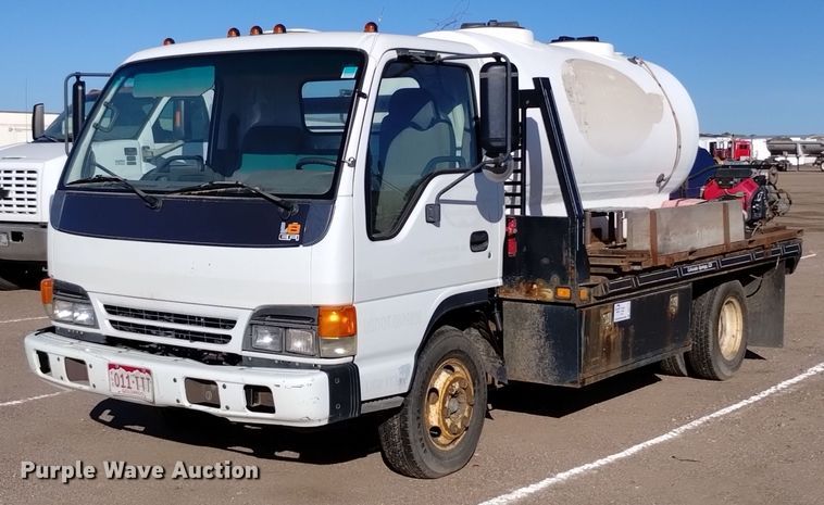 2002 Isuzu  NPR flatbed truck - DQ6172