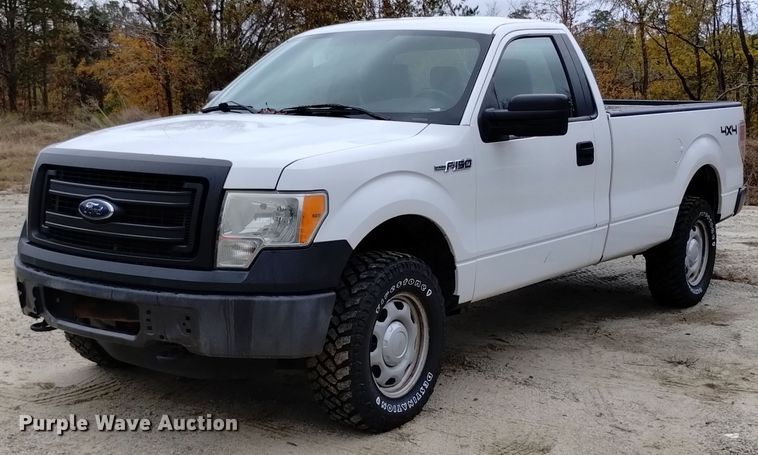 2013 Ford F150 pickup truck - OJ9903