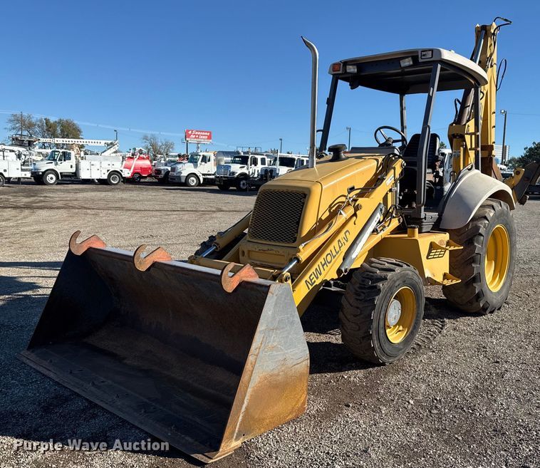 1999 New Holland 555E backhoe - EG2275