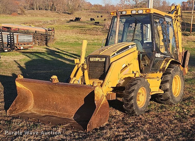 1999 Caterpillar 416C backhoe - OJ9133