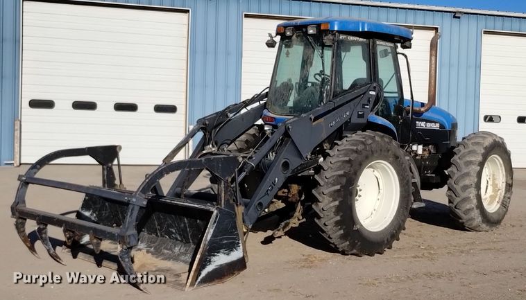 2002 New Holland  TV140 bi-directional tractor - EG9980