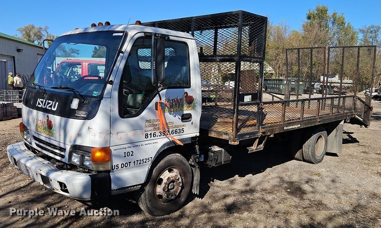 2002 Isuzu  NPR flatbed truck - EI8532