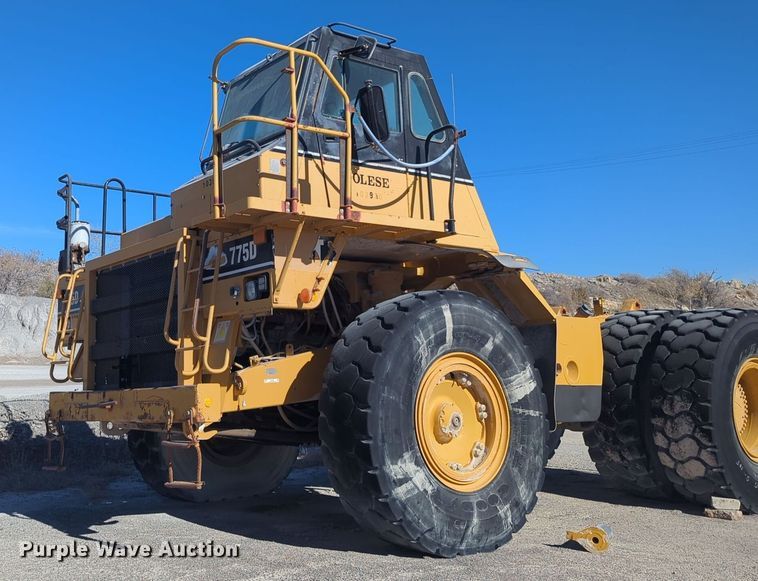 2000 Caterpillar 775D water wagon - ER4585
