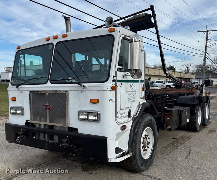 1993 Peterbilt  320 roll-off container truck - OG9775