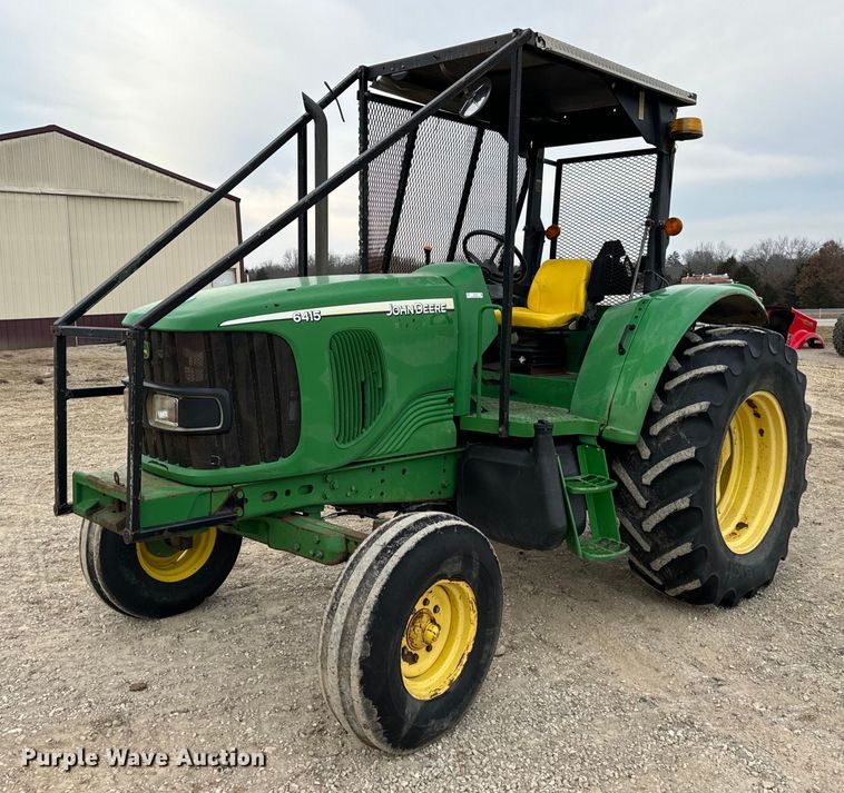 John Deere 6415 MFWD tractor - EH7395