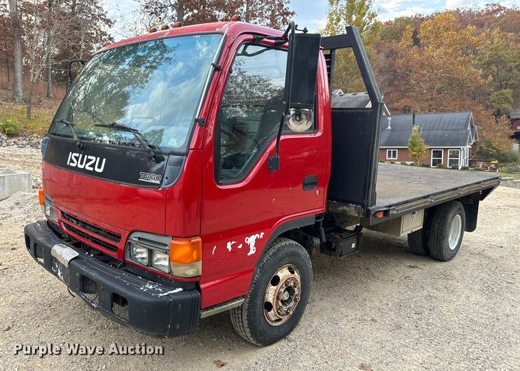 1997 Isuzu NPR flatbed truck - EH7177