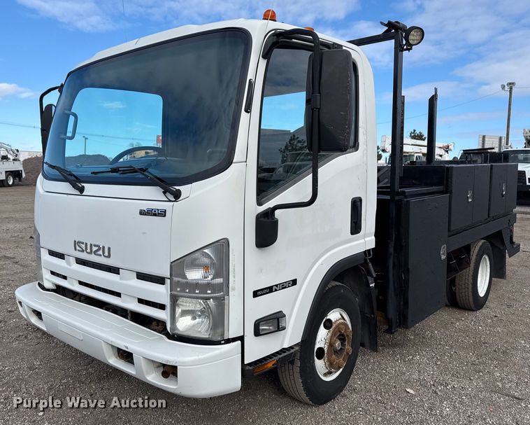 2014 Isuzu NPR flatbed truck - EG2492