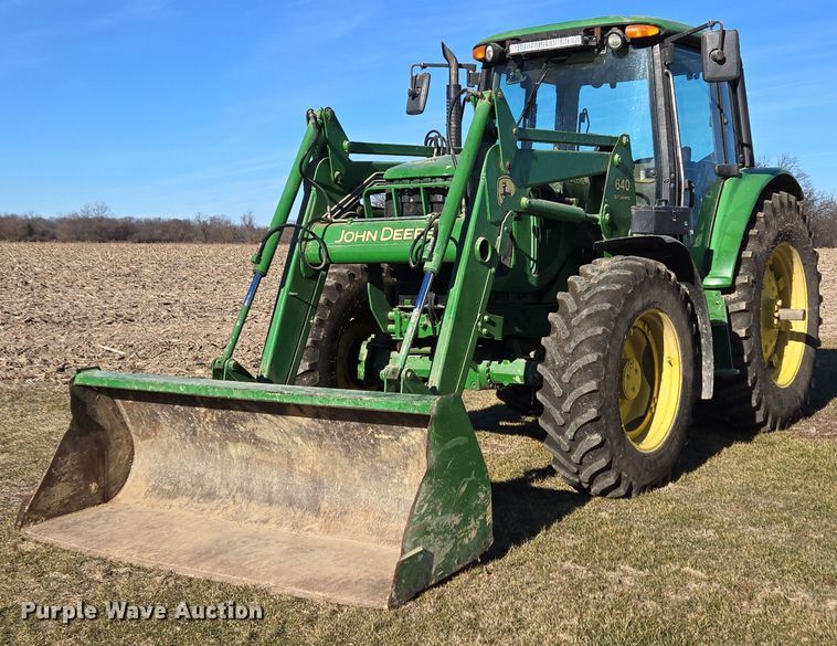 2002 John Deere 6420 MFWD tractor - DH9793