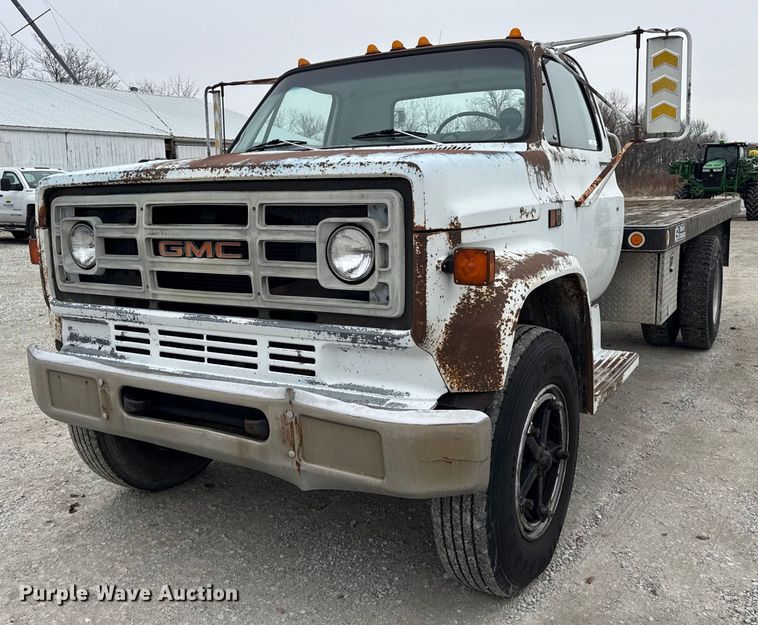 1985 GMC C7000 dump flatbed truck - DH9564
