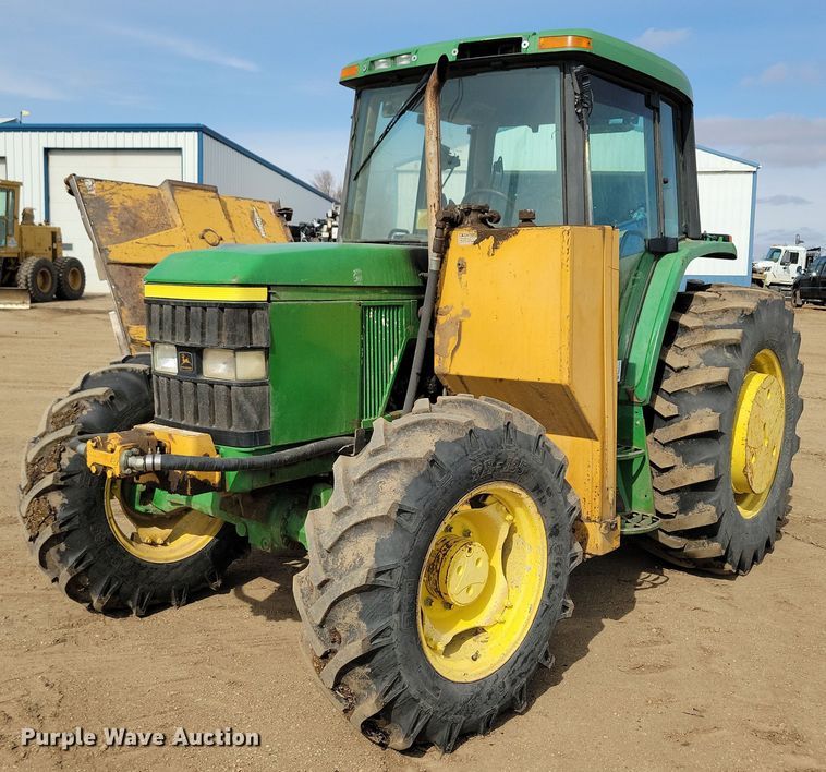 1999 John Deere  6210 MFWD tractor - DN3703