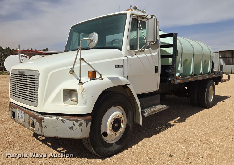 1995 Freightliner FL60 flatbed truck - DW8554