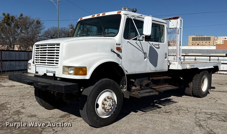 1999 International 4300 Crew Cab flatbed truck - ED5506
