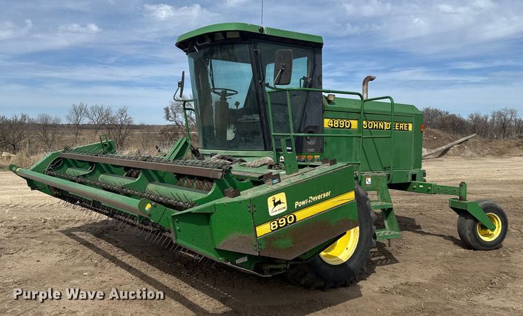 1999 John Deere 4890 SP swather / windrower - NN9739