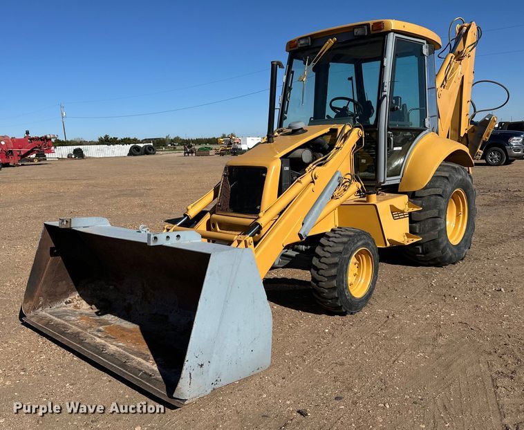 1997 New Holland 575E backhoe - EQ4631
