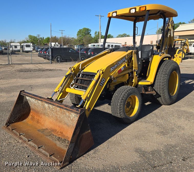 John Deere 110S backhoe - EO0731
