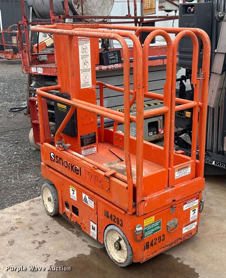 Snorkel TM12 Scissor or Vertical Lift For Sale | Purple Wave Auction