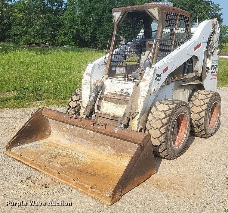 2009 Bobcat S250 skid steer loader - DW7061