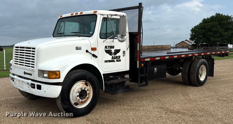 2001 International 4700 dump flatbed truck - DY0654