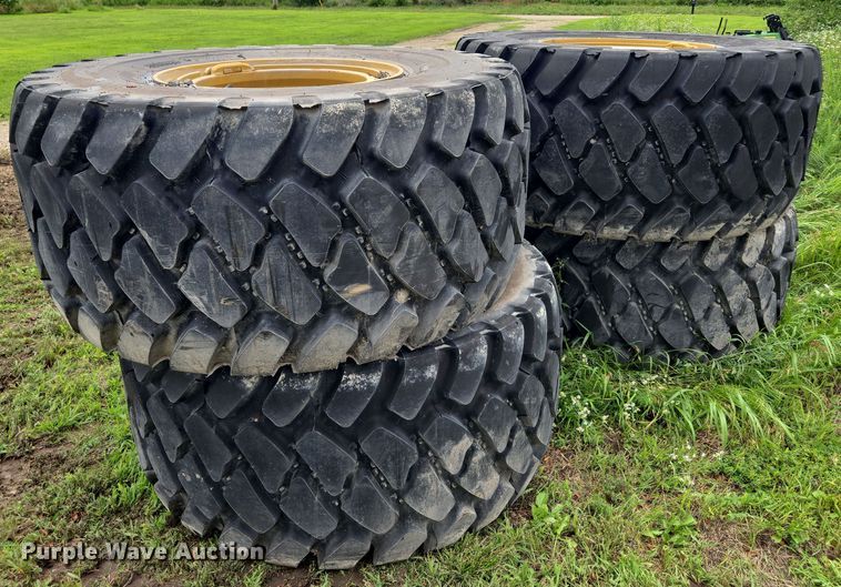 (4) Bridgestone 750/65R25 tires and wheels - EF1604