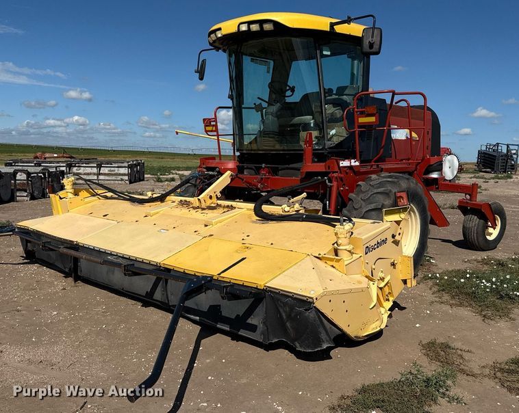 2009 New Holland H8080 swather / windrower - DK6959