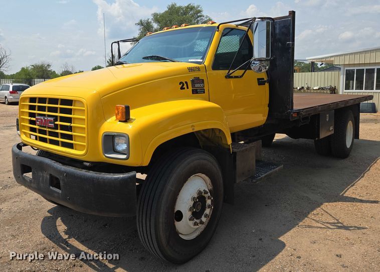 1999 GMC C7 flatbed truck - EN8344