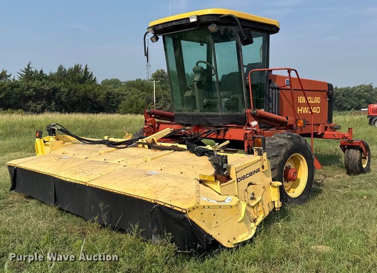 1999 New Holland HW340 swather / windrower - ER2118