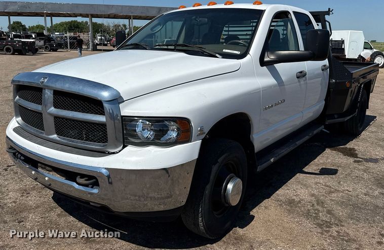2005 Dodge Ram 3500 Quad Cab flatbed pickup truck - DZ8660