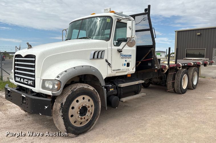 2008 Mack GU713 flatbed truck - EM0583