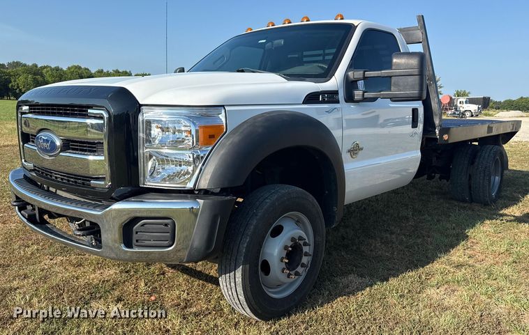 2012 Ford F550 flatbed truck - DJ7769