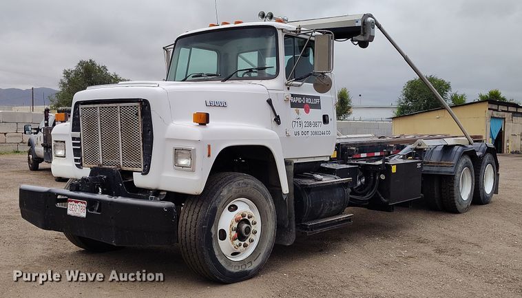 1995 Ford LT9000 roll-off container truck - DP8896