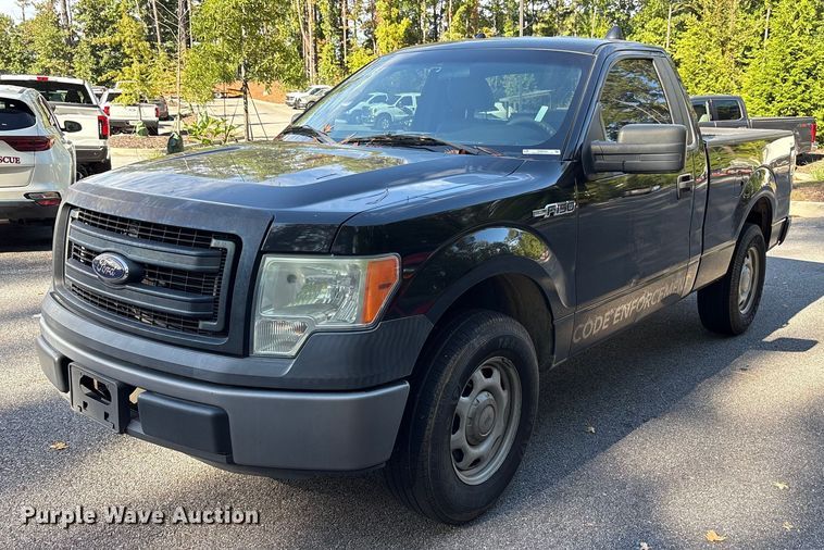 2014 Ford F150 pickup truck - EM6058