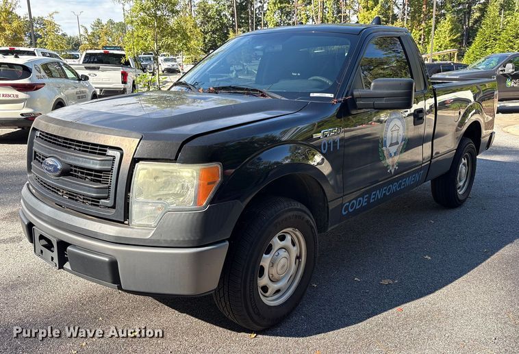 2014 Ford F150 pickup truck - EM6059