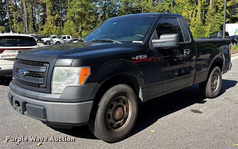 2014 Ford F150 pickup truck - EM6061