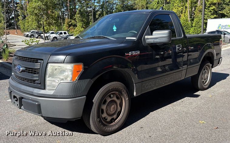 2014 Ford F150 pickup truck - EM6062