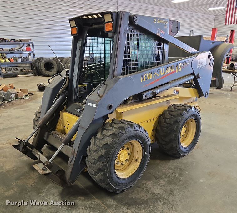 2001 New Holland LS180 skid steer loader - DY1422
