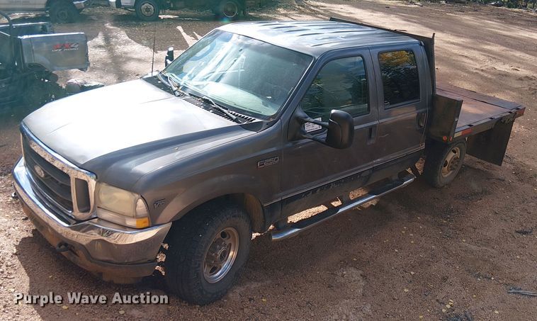 2003 Ford F250 Super Duty Crew Cab dump flatbed pickup truck - EC1211