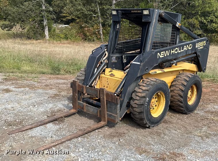 1997 New Holland LX865 skid steer loader - EU5054