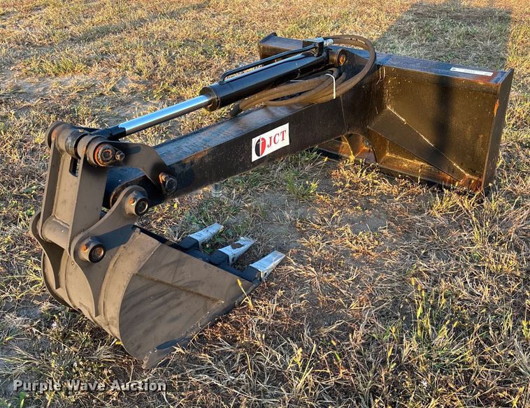JCT skid steer backhoe - EV3132